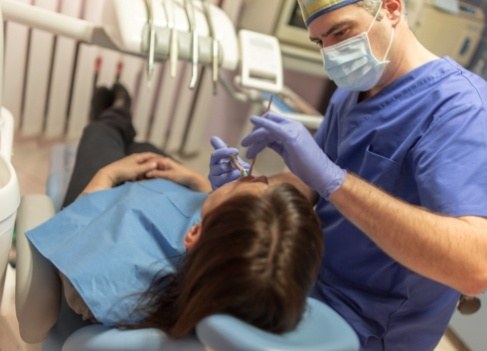 Dentist treating dental patient