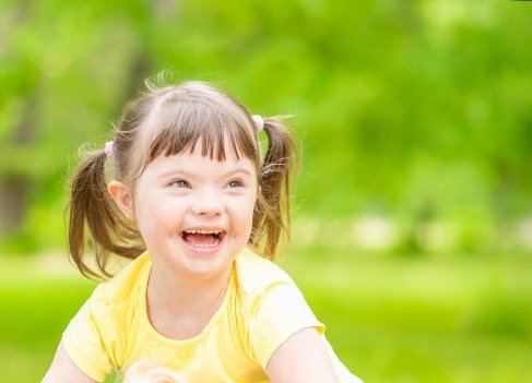 Child laughing after special need children's dentistry visit