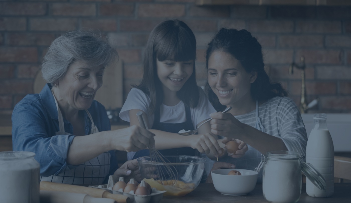 Mother daughter and granddaughter cooking together