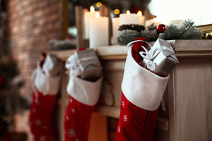 Stockings hung up by a fireplace